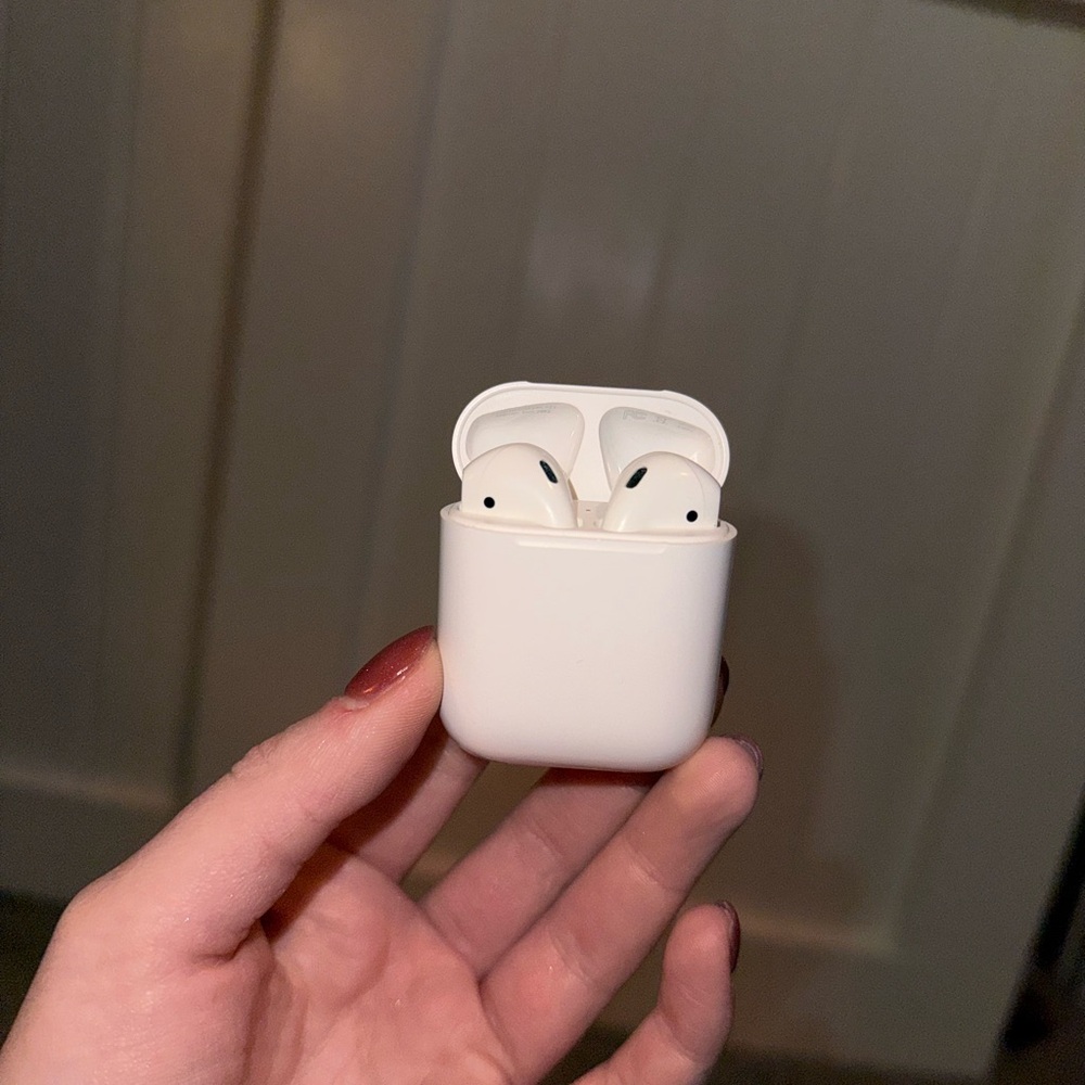Apple AirPods (2nd Generation) in Lightning Charging Case.